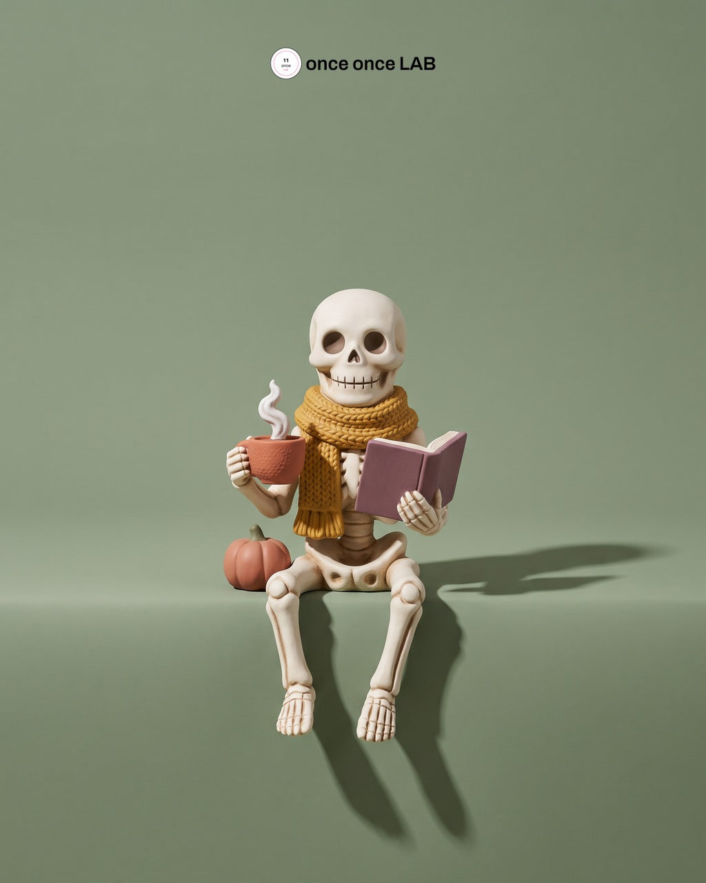 Esqueleto con Té y Libro — Figura para Repisa de Halloween en Tonos Tierra — once once LAB