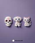 Set de 3 imanes de calaveritas de Día de Muertos sobre un refrigerador