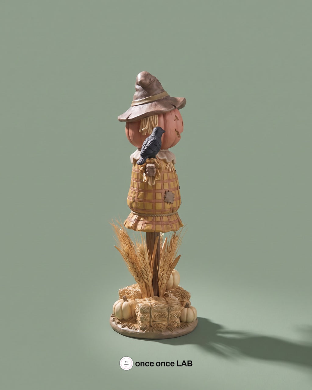 Espantapájaros Cabeza de Calabaza con Cuervo — Figura Decorativa de Otoño y Halloween — Once Once Lab